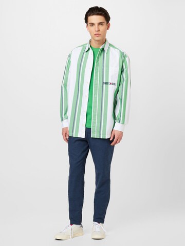 Tricou de la Tommy Jeans pe verde