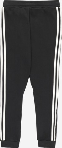 Tapered Pantaloni 'Trefoil' di ADIDAS ORIGINALS in nero