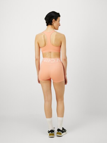 NIKE Skinny Sportshorts in Orange: Rückseite