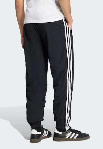 Effilé Pantalon 'Firebird' ADIDAS ORIGINALS en noir