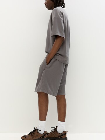 Loosefit Pantaloni di Pull&Bear in grigio