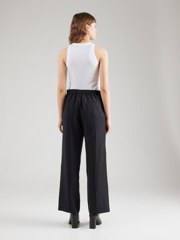 Wide leg Pantaloni con pieghe 'Sahani' di Samsøe Samsøe in nero