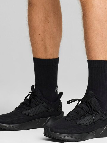 PUMA Sportschuh in Schwarz