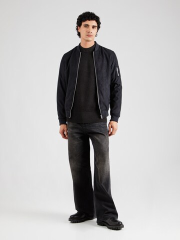 Pull-over Tommy Jeans en noir