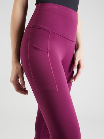 NIKE Skinny Sportbroek 'UNIVERSA' in Roze