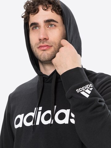 ADIDAS SPORTSWEAR Sports sweatshirt 'Essentials French Terry Linear Logo' in Black