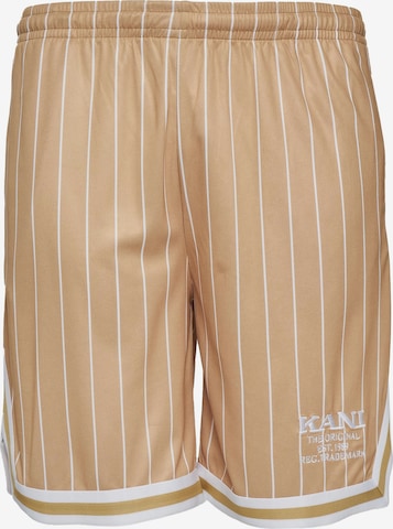 Loosefit Pantalon Karl Kani en beige : devant
