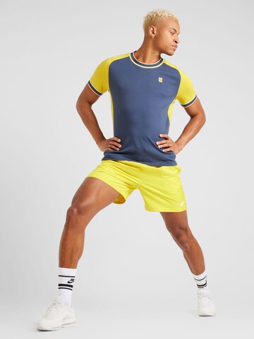 Nike Sportswear Ohlapna forma Hlače 'Club' | rumena barva