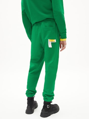 ARMEDANGELS Tapered Pants in Green