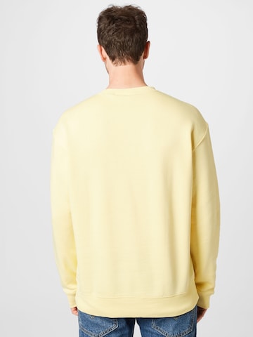 ADIDAS SPORTSWEAR Sports sweatshirt 'Essentials Feelvivid  Fleece Drop Shoulder' in Yellow