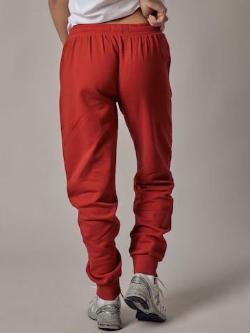 regular Pantaloni 'Felpati' di OWN Off With Nature in rosso