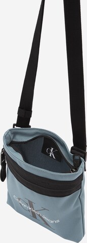 Calvin Klein Jeans Crossbody Bag in Blue