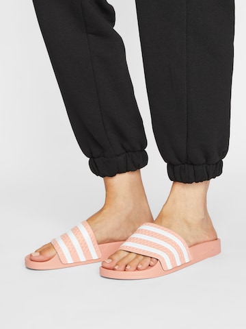 ADIDAS ORIGINALSNatikače s potpeticom 'Adilette' - narančasta boja
