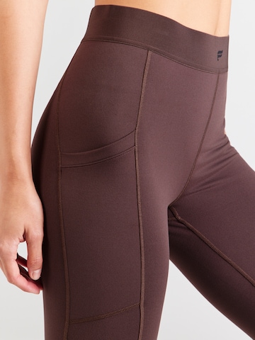 Fabletics Skinny Workout Pants 'ON-THE-GO' in Brown