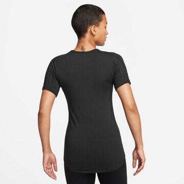 NIKE Functioneel shirt 'SWIFT' in Zwart