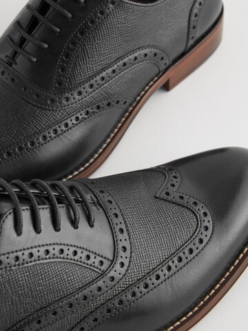 Chaussure à lacets Next en noir