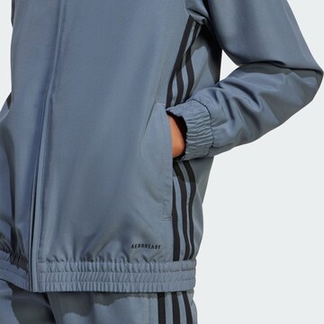 Veste de survêtement 'Tiro 25 Essential' ADIDAS PERFORMANCE en bleu