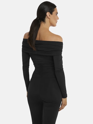 Nicowa Jumpsuit 'FIOLIW' in Zwart