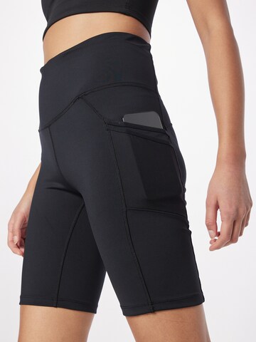 COLUMBIA Skinny Sportbroek in Zwart