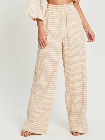 The Fated Wide leg Trousers in Beige: front