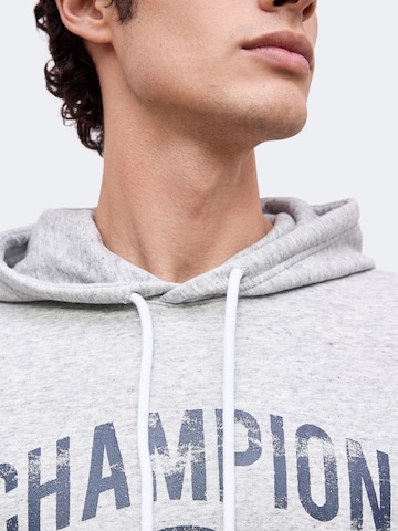 Champion - Sudadera en gris