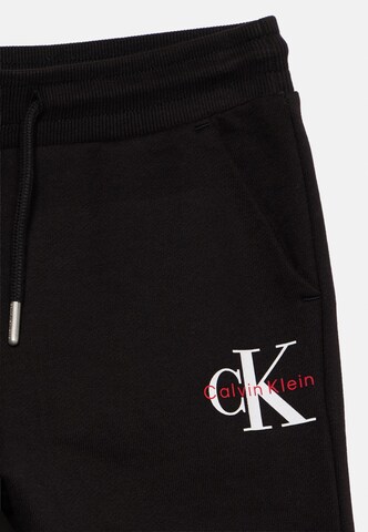 juoda Calvin Klein Jeans Siaurėjantis Kelnės