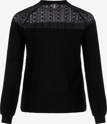 EVOKED - Blusa en negro