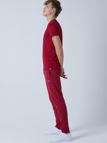 Coupe slim Pantalon de sport 'Slim Training Pants' SPORTKIND en rouge