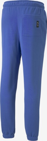 Regular Pantalon de sport 'Pivot EMB' PUMA en bleu