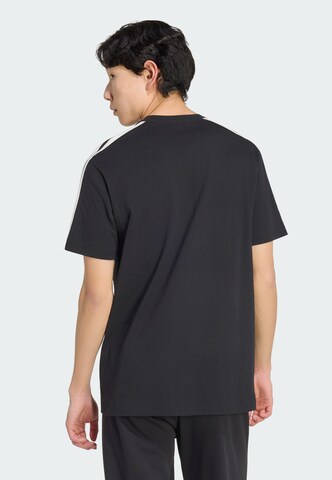 ADIDAS SPORTSWEAR - Camiseta funcional 'Kit' en negro