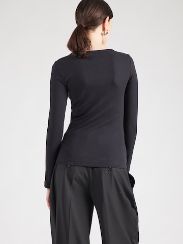 Lee T-shirt i svart: baksida