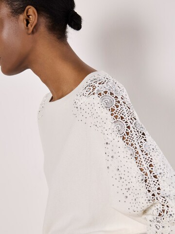 Pull-over ' ' Apricot en blanc