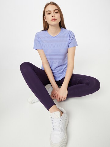 purpurinė new balance Sportiniai marškinėliai