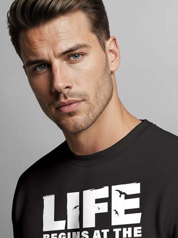 Neverless Sweatshirt 'life begins' in Schwarz