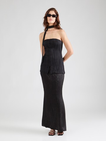 Top 'Mariela' di millane in nero