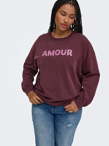 Sweat-shirt 'CAREmelie' ONLY Carmakoma en rouge