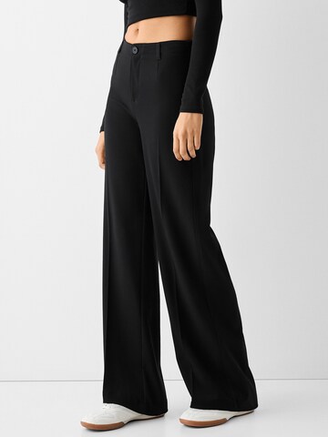 Wide leg Pantaloni cu dungă de la Bershka pe negru