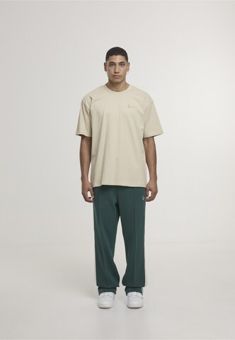 Karl Kani T-Shirt in Beige