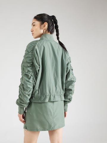 ADIDAS ORIGINALS - Chaqueta de entretiempo en verde