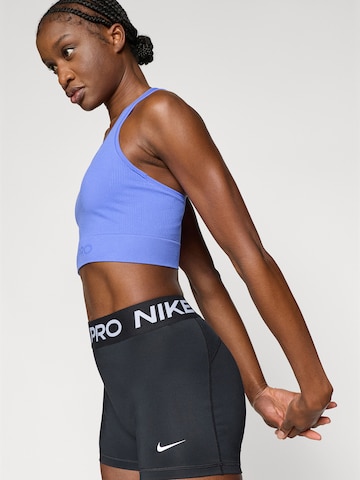 NIKE Sporttop in Lila