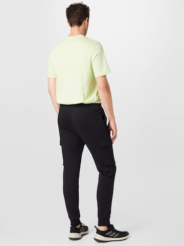 Effilé Pantalon de sport 'Essentials Fleece' ADIDAS SPORTSWEAR en noir