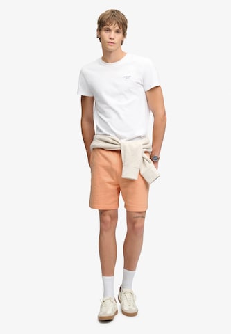 Superdry & Co Loosefit Broek 'Essential' in Oranje