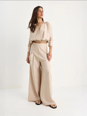 Pantalons de tailleur Bianco Lucci en beige