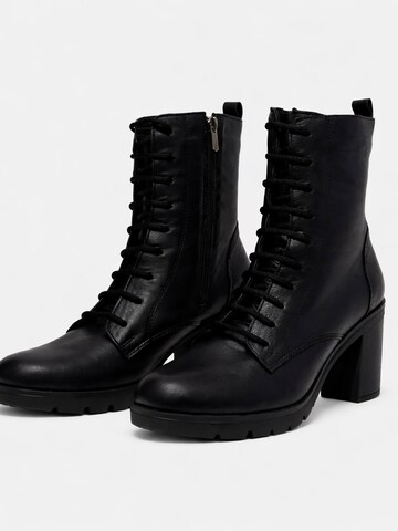 Lorévine Ankle boots in Black
