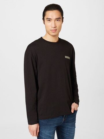 Calvin Klein - Camiseta en negro: frente