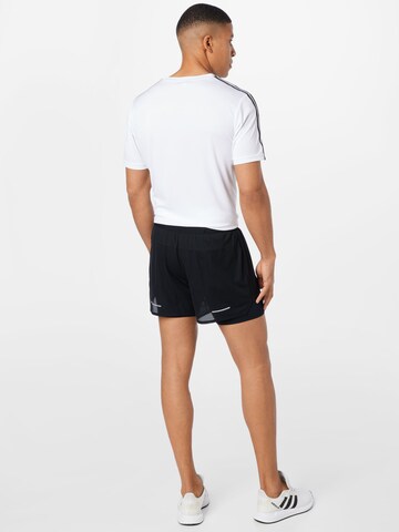 ASICS Loosefit Sportbroek in Zwart