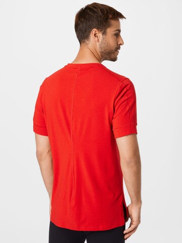 NIKE Funkční tričko – červená