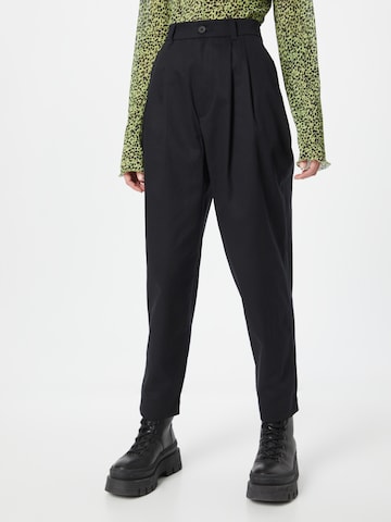 MELAWEAR Tapered Pleat-Front Pants 'NEHA' in Black: front