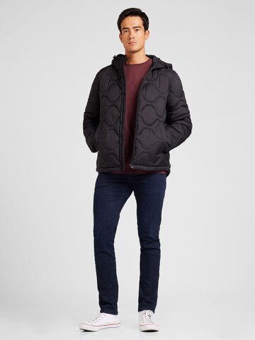 TOMMY HILFIGER Tussenjas in Zwart