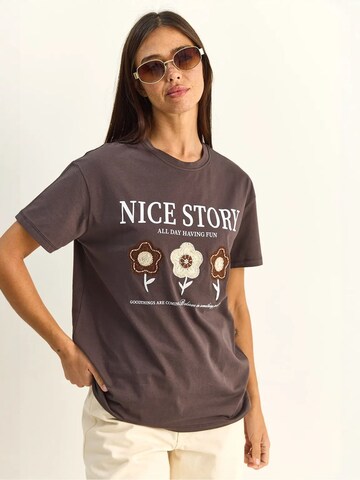 T-shirt 'T-Shirts' Bianco Lucci en marron